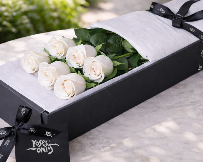 long stemmed white roses in gift box