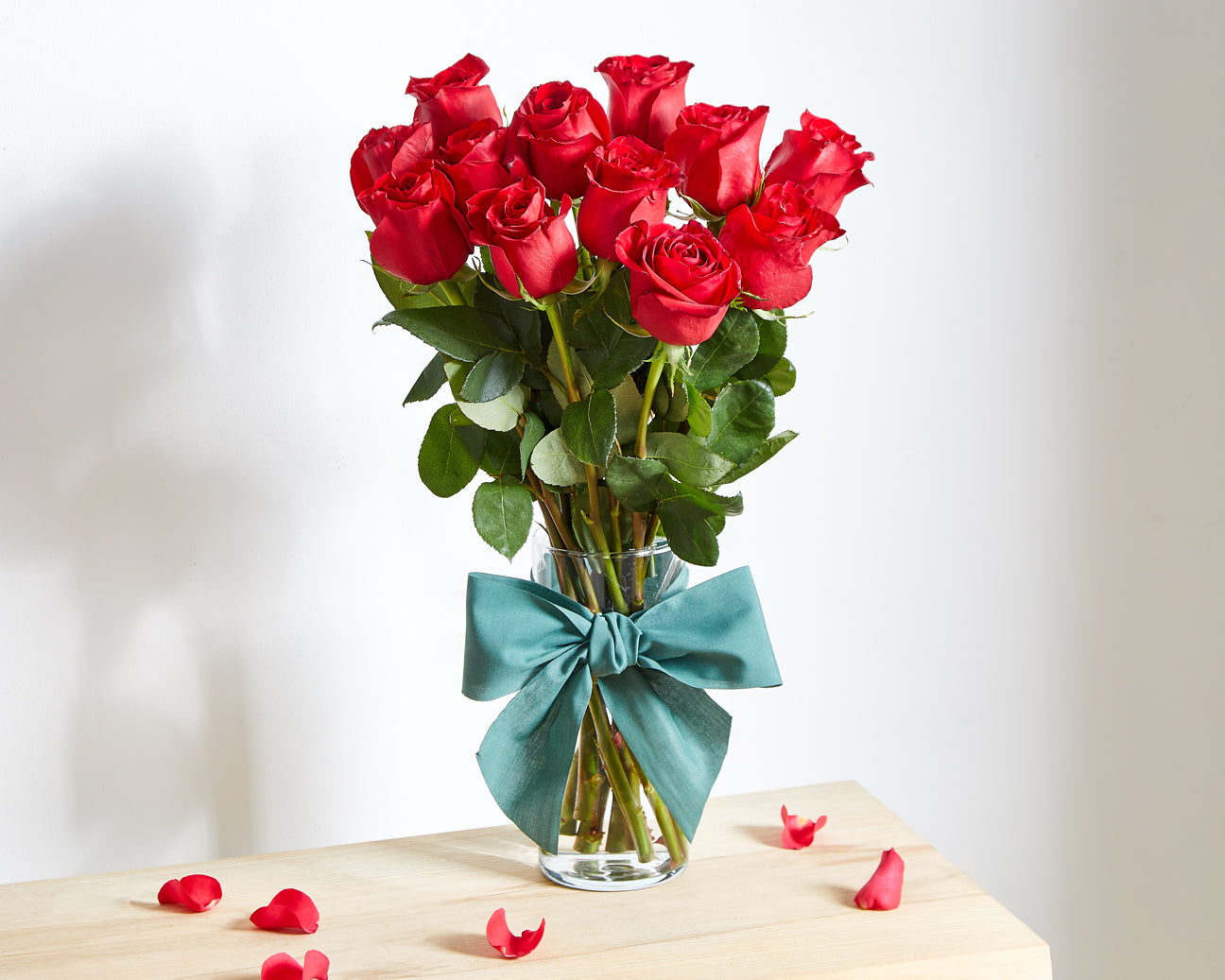 https://www.rosesonly.co.uk/cdn/shop/products/12-Red-Roses-main-1_1296x.jpg?v=1674838354